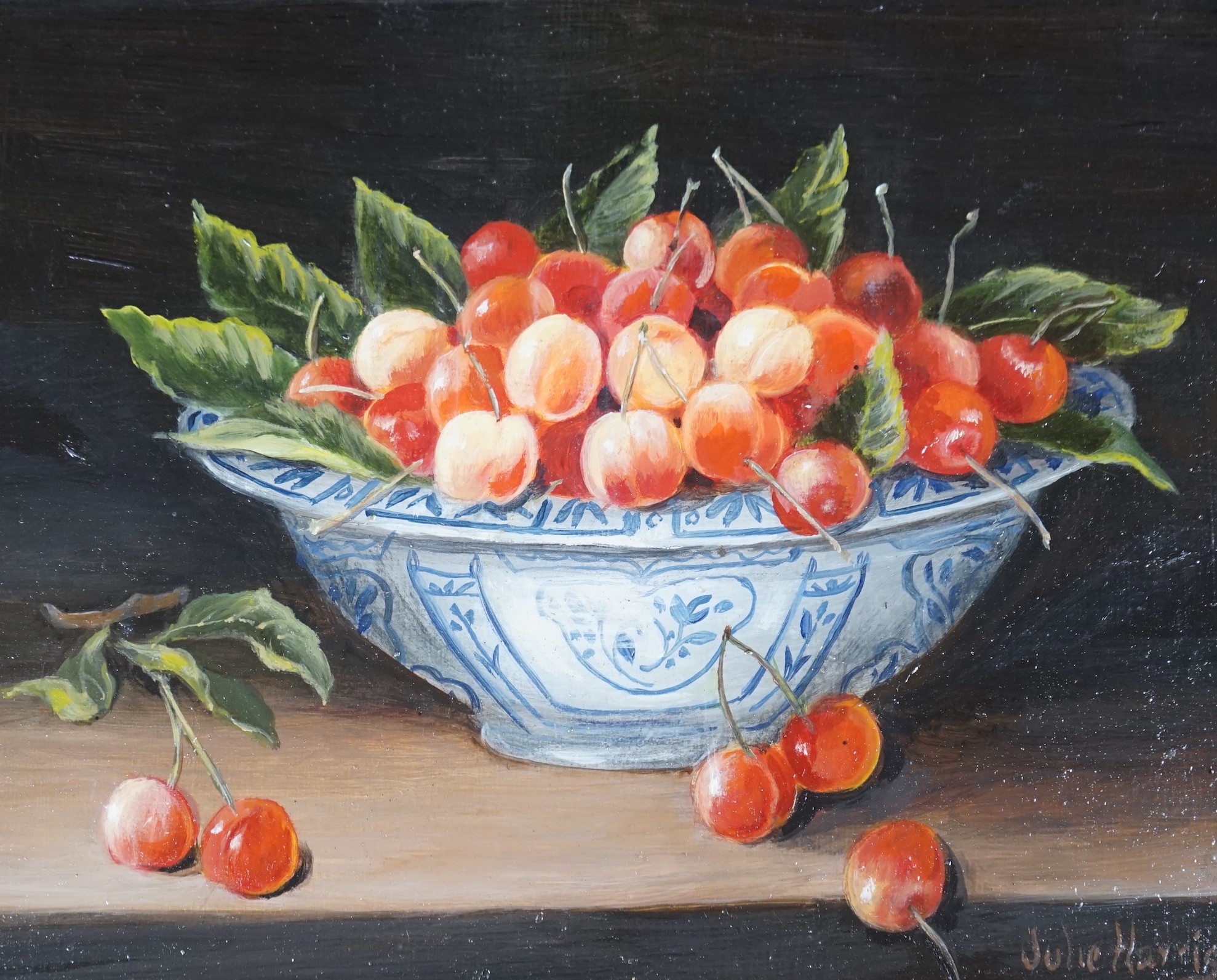 Julie Harris (b.1953), oil on panel, Still life of cherries in a delft bowl, signed, 20 x 25cm